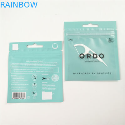 Low MOQ clear front dental floss hang hole plastic packaging bags aluminum foil zipper bag packaging