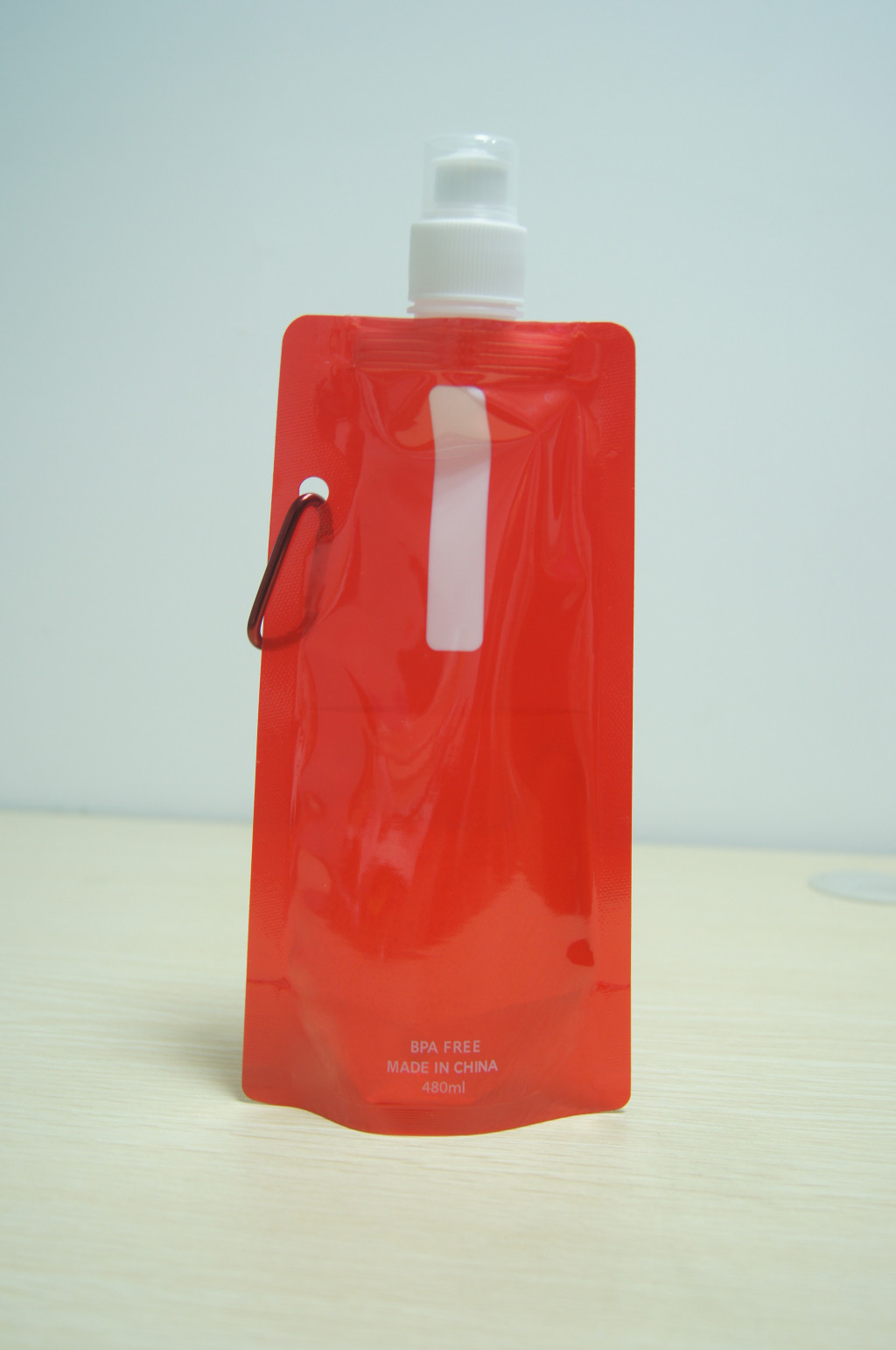 Bright Red Plastic Stand Up Pouch with Metal Hook Drink Packaging/stand up pouch for juice/baby food stand up pouch